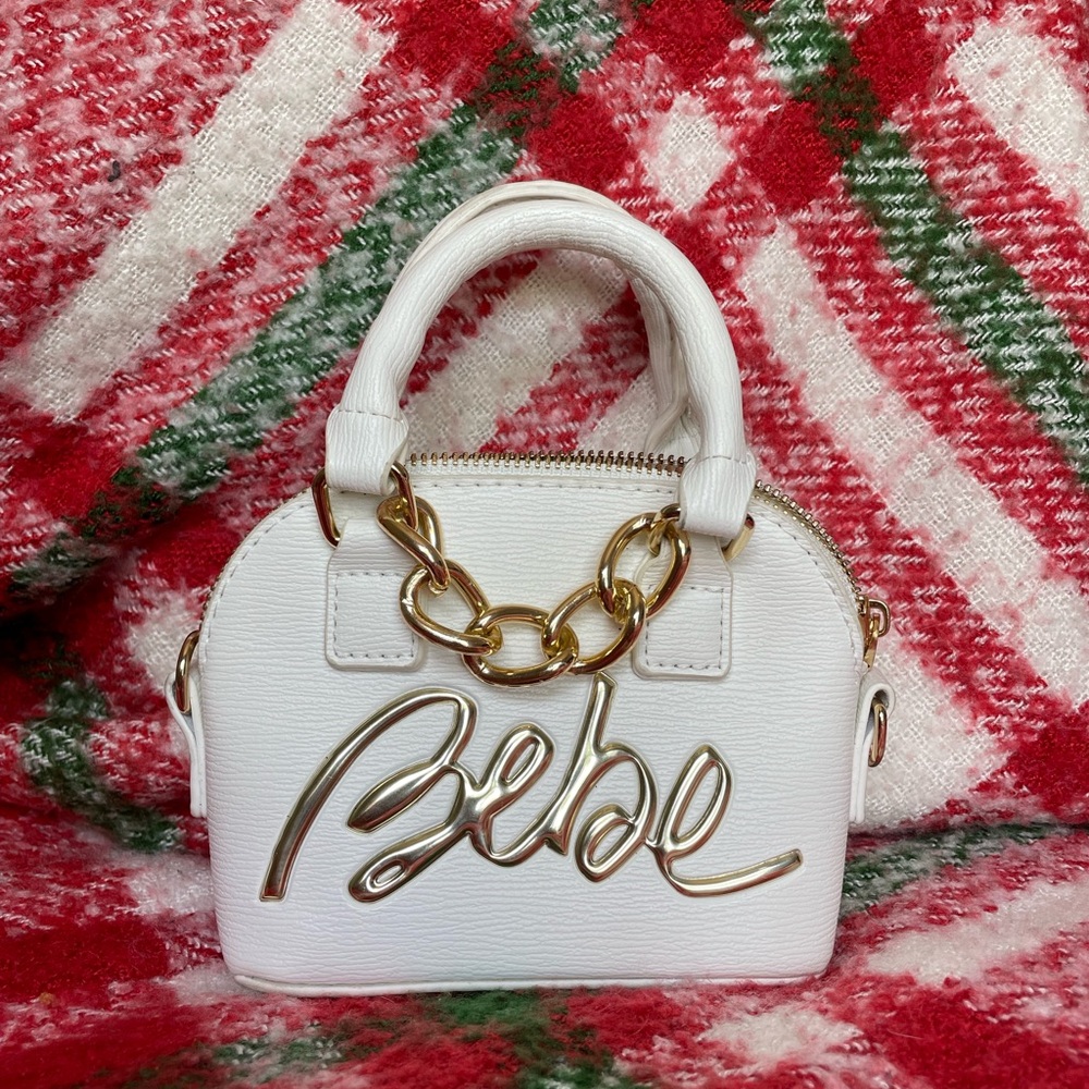 Small white bebe hand purse
